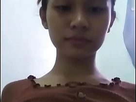 Hot young khmer girl taking selfie close to naked body